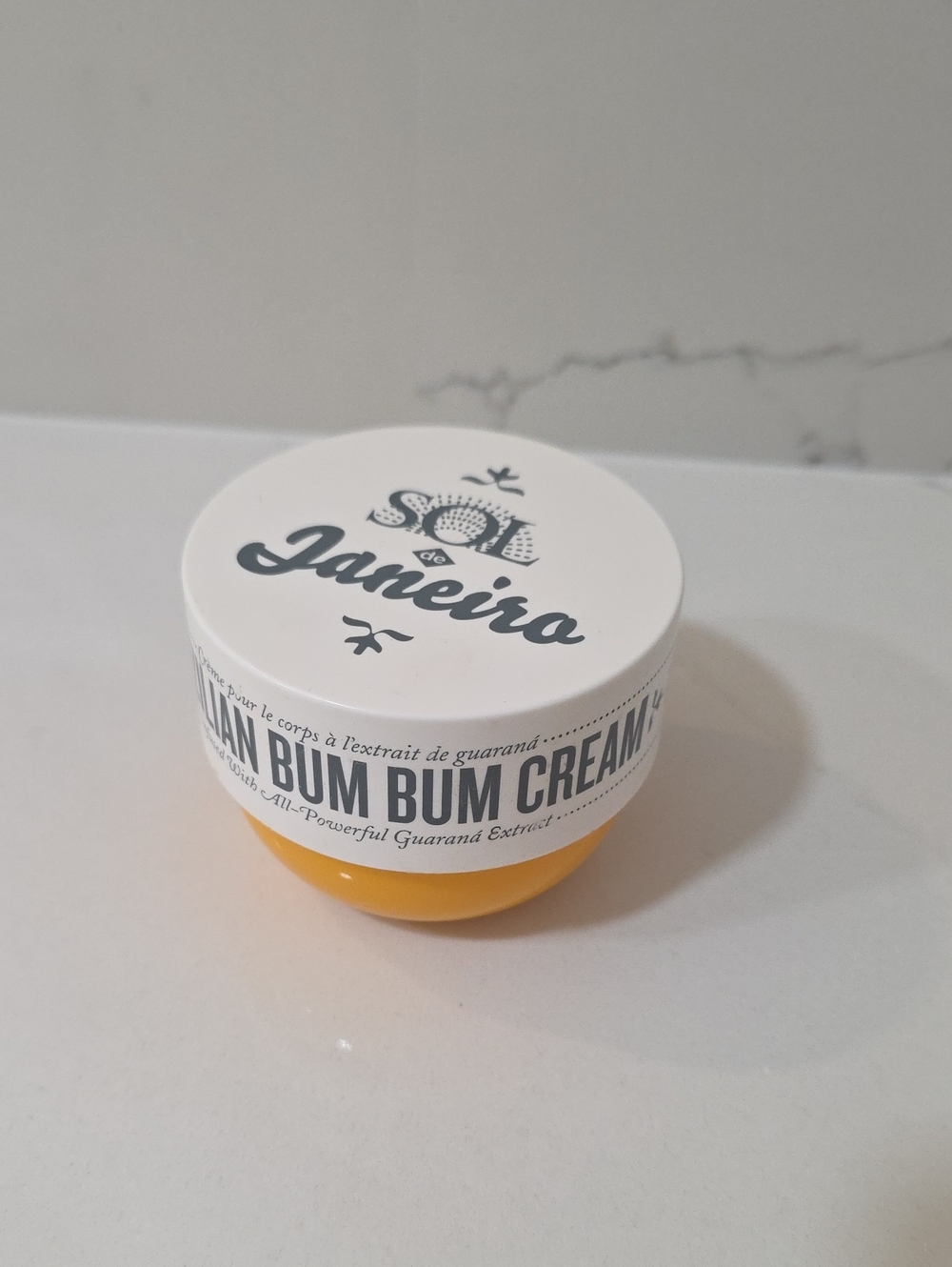 Sol de Janeiro Moisturizing Body Cream Jar in White and Yellow Container Only
